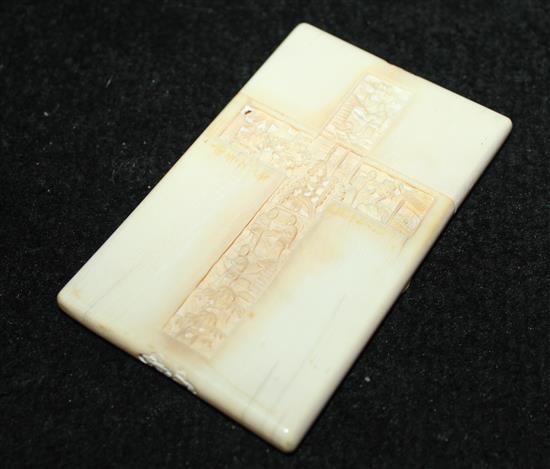 Chinese export ivory card case carved each side with a cross containing figures, pagodas & gardens